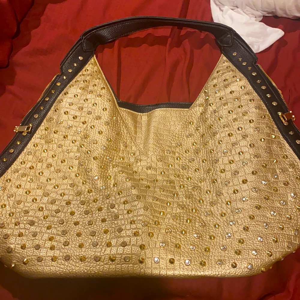 New multi beaded bad with strap to hook on